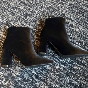 Black heel boots. Never worn. New.